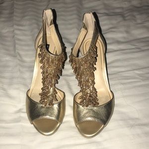 Gold high heels